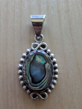 Sterling Silver Pendant with Abalone center